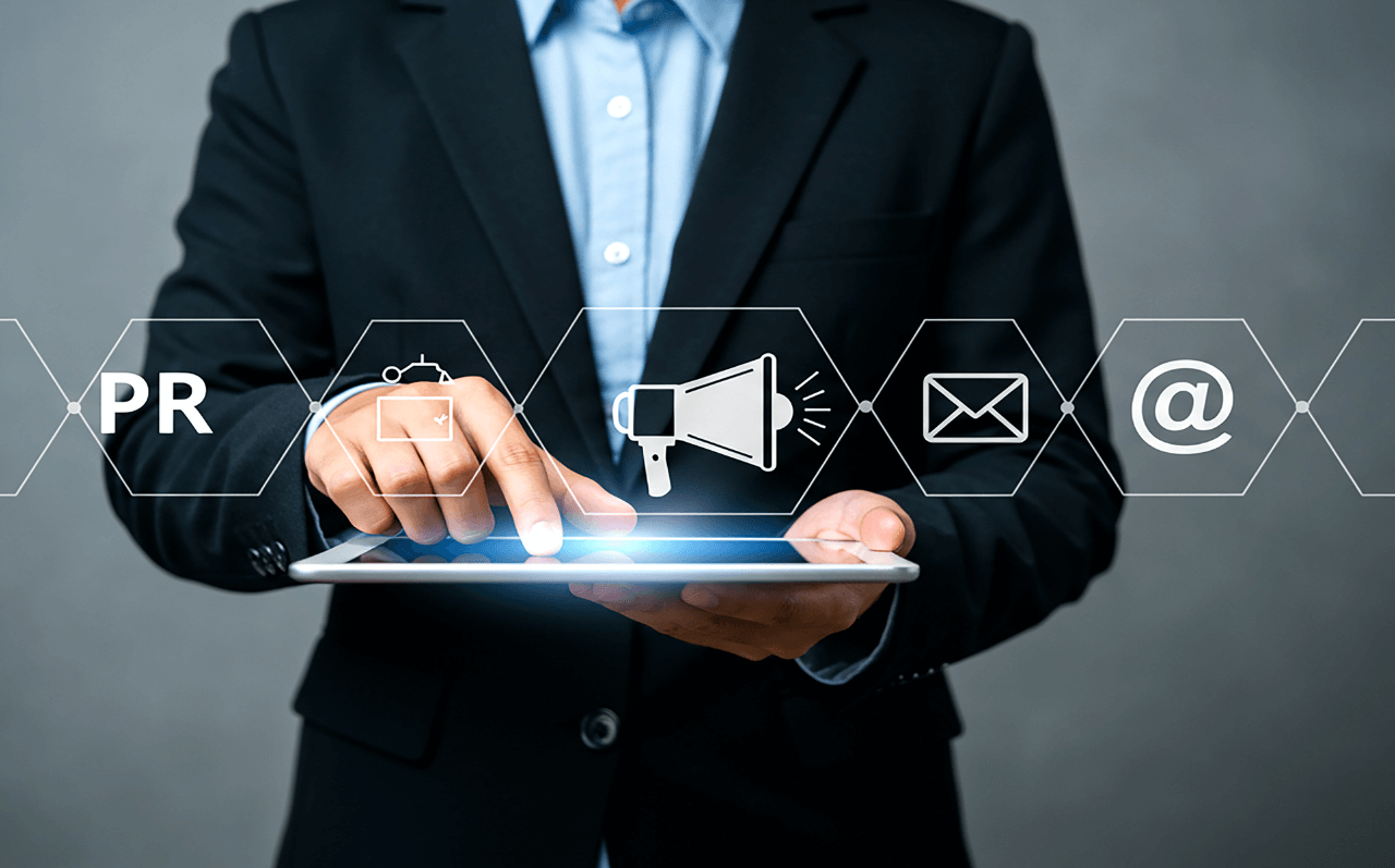 Businessman selecting digital icons on a tablet